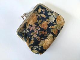 isolated vintage wallet with flower pattern. Good for any kind of business related to classic, retro, money, saving photo