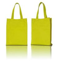 yellow fabric bag on white background photo