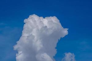 white clouds in the blue sky photo