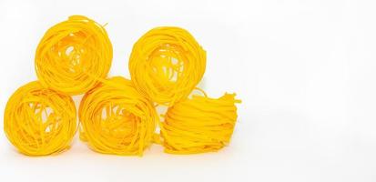 Italian egg pasta nest, great design for any purposes. Healthy vegetarian food. Italian lunch. Healthy diet. photo