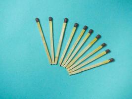 Matches on a blue background. Fire-starting products photo