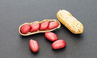 peanuts on black background photo