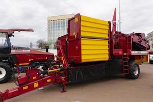 Minsk, Belarus, September 10, 2022- Exhibition of agricultural machinery. Potato harvester, PT260-2, Gomselmash, red, new. photo