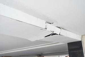 Ceiling panels broken and damage from car crash photo