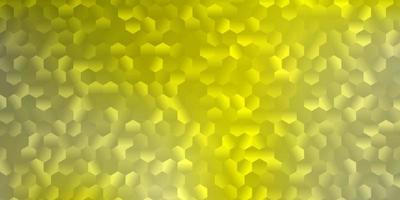 Light yellow vector pattern with hexagons.