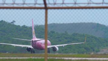 PHUKET, THAILAND DECEMBER 5, 2016 - NOK Air Boeing 737 HS DBE named Flamingo accelerate before departure video