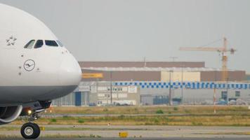 FRANKFURT AM MAIN, GERMANY JULY 19, 2017 - Lufthansa Airbus 380 D AIMH named  New York  taxiing to start. Fraport, Frankfurt, Germany video