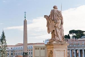 view Egyptian obelisk on St.Peter Square from Piazza Pio, Vatican, Italy photo