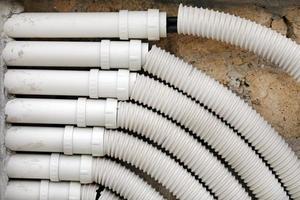 Various pipes and tubes at a construction site photo