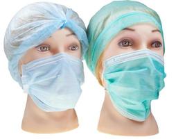 cabezas de doctores ficticias con gorro quirúrgico textil y máscara foto