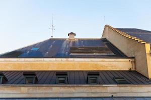 mansard roof of urban house in Paris photo
