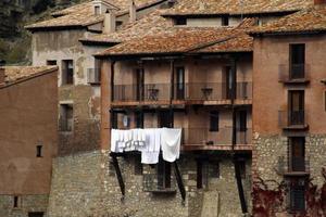 Beautiful old architecture and buildings in the mountain village of Albarracin, Spain photo