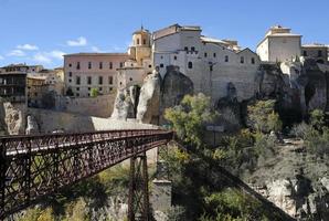 Beautiful buildings in Cuenca, Spain, during autumn season photo