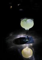 Beautiful cocktail in a glass with a blurred background photo