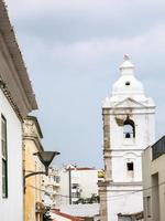 Bell tower of church in Lagos Portugal city photo