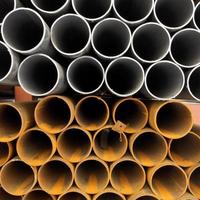 tops of construction pipes close up photo