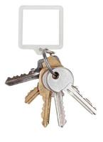 bunch of door keys on ring and square keychain photo