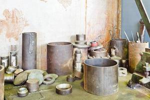 metal components and workpiece on table photo