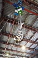 hooks of weigher bridge crane in warehouse photo