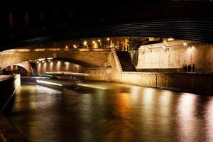 bridge and Seine river at night, Paris photo