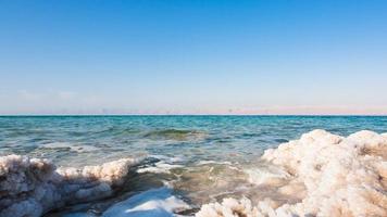 salt close up on coast of Dead Sea photo