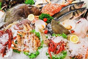 raw fish and seafood in ice photo