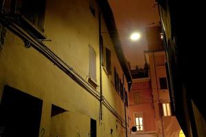 medieval street in Bologna at night photo