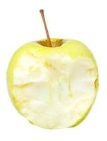 la mitad de la deliciosa manzana dorada amarilla foto