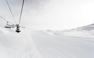 skiing tracks and ski lift in Paradiski area, France photo