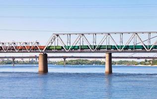 railroad bridge through river photo