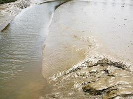 muddy bank of Jaudy river in Brittany photo