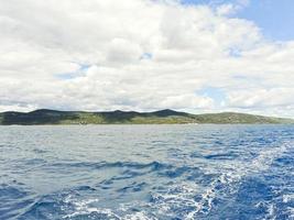 green shore of Adriatic Sea in Dalmatia photo