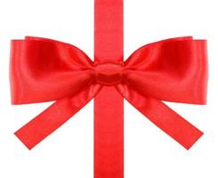 red bow with square cut ends on vertical ribbon photo