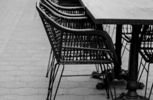 Tables and chairs of a street restaurant. photo