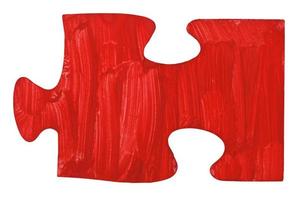 one hand painted red piece of jigsaw puzzle photo