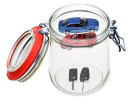 new cars and keys in glass jar photo