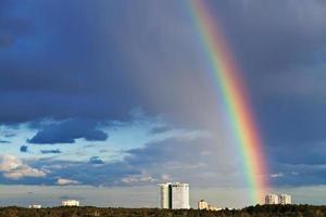 urban panorama with rainbow photo