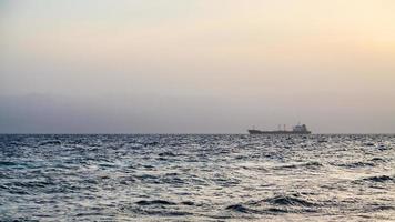 yellow evening twilight over Gulf of Aqaba photo