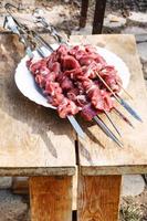 raw lamb shish kebabs on skewers photo