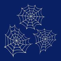 Halloween cobwebs elements. Hand drawn vector illustration with spider webs. Isolated on dark blue background. For Halloween party decoration, scrapbooking, textile, greeting cards design, wall paper.