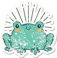 worn old sticker of a tattoo style happy frog vector