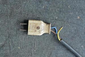 the power cord is broken, A portrait of hand tools. photo
