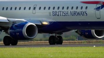 AMSTERDAM, THE NETHERLANDS JULY 26, 2017 - British Airways CityFlayer Embraer 190 G LCYR braking after landing on runway 18R Polderbaan. Shiphol Airport, Amsterdam, Holland video