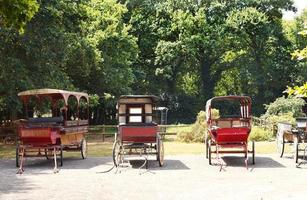 old carriages in village, France photo