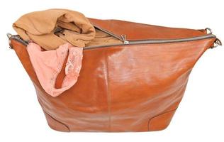 ajar leather bag with blouse and pink lace panties photo