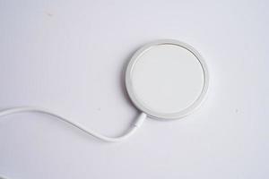 Wireless charger, magnetic charging modern equipment of mobile phone. photo