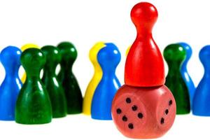 lucky leader by wooden figurines isolated photo