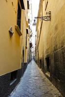 narrow street in old city of Naples photo