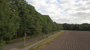 Aerial view of farm land fields planted with crops video