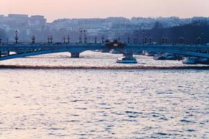 Bridge in Paris on pink blue sunset photo